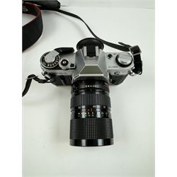 Canon AE-1 camera body, serial no. 3484113, with a Canon Zoom Lens FD 35-70mm 1:4, serial no. 103833, together with a Canon EOS 30D camera body, serial no. 1230810818, with a   Canon Zoom Lens EF-S 18-55mm 1:3.5-5.6 II, serial no. 2140596539, in Tuf Foto Pro carry case, with accessories 