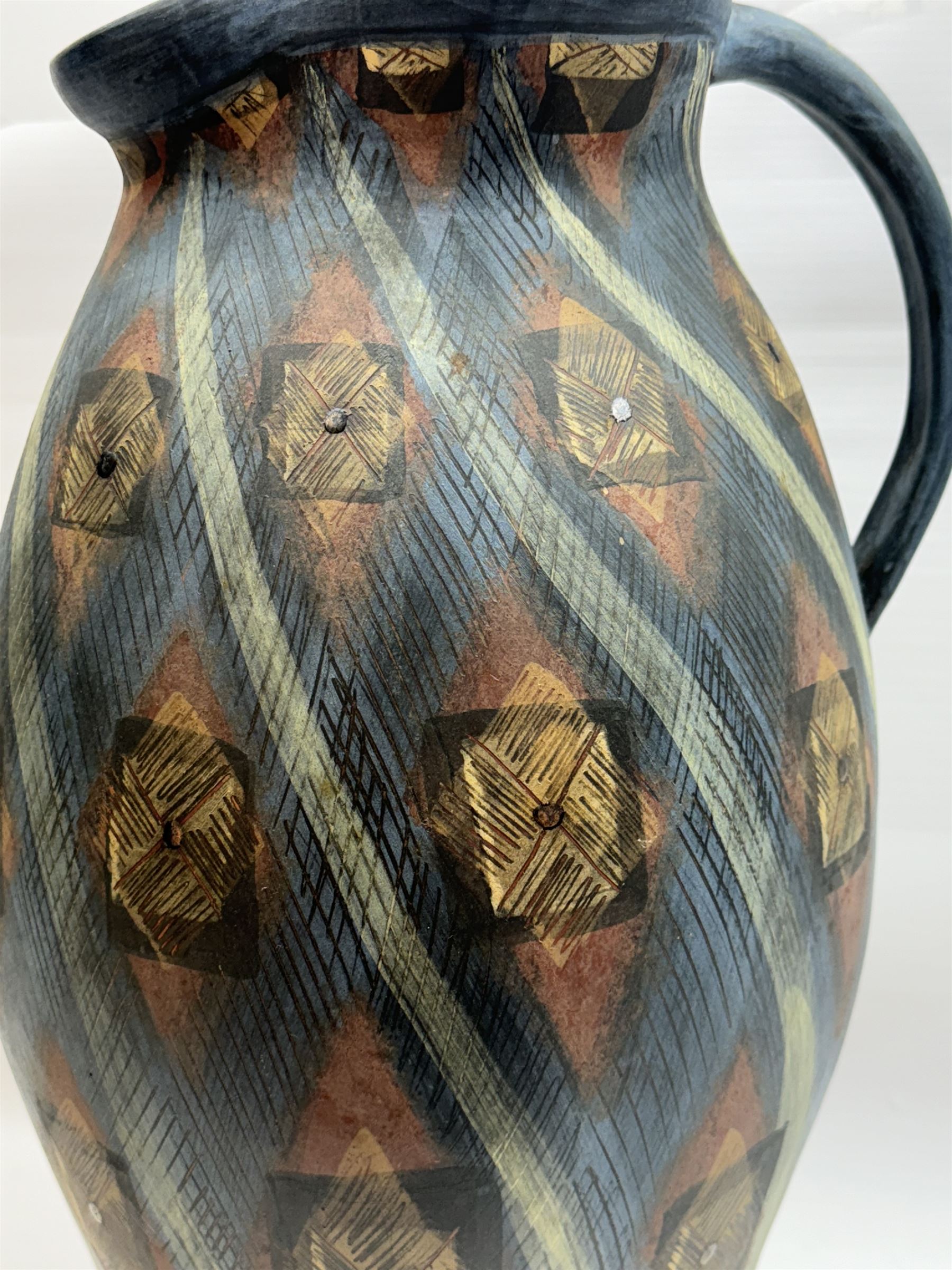 Jackie Walton; Studio pottery large jug decorated with geometric patters, together with another Jackie Walton vase, jug H52cm