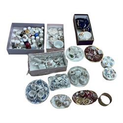 Collection of miniature tea services and teacups, together with a collection of thimbles 