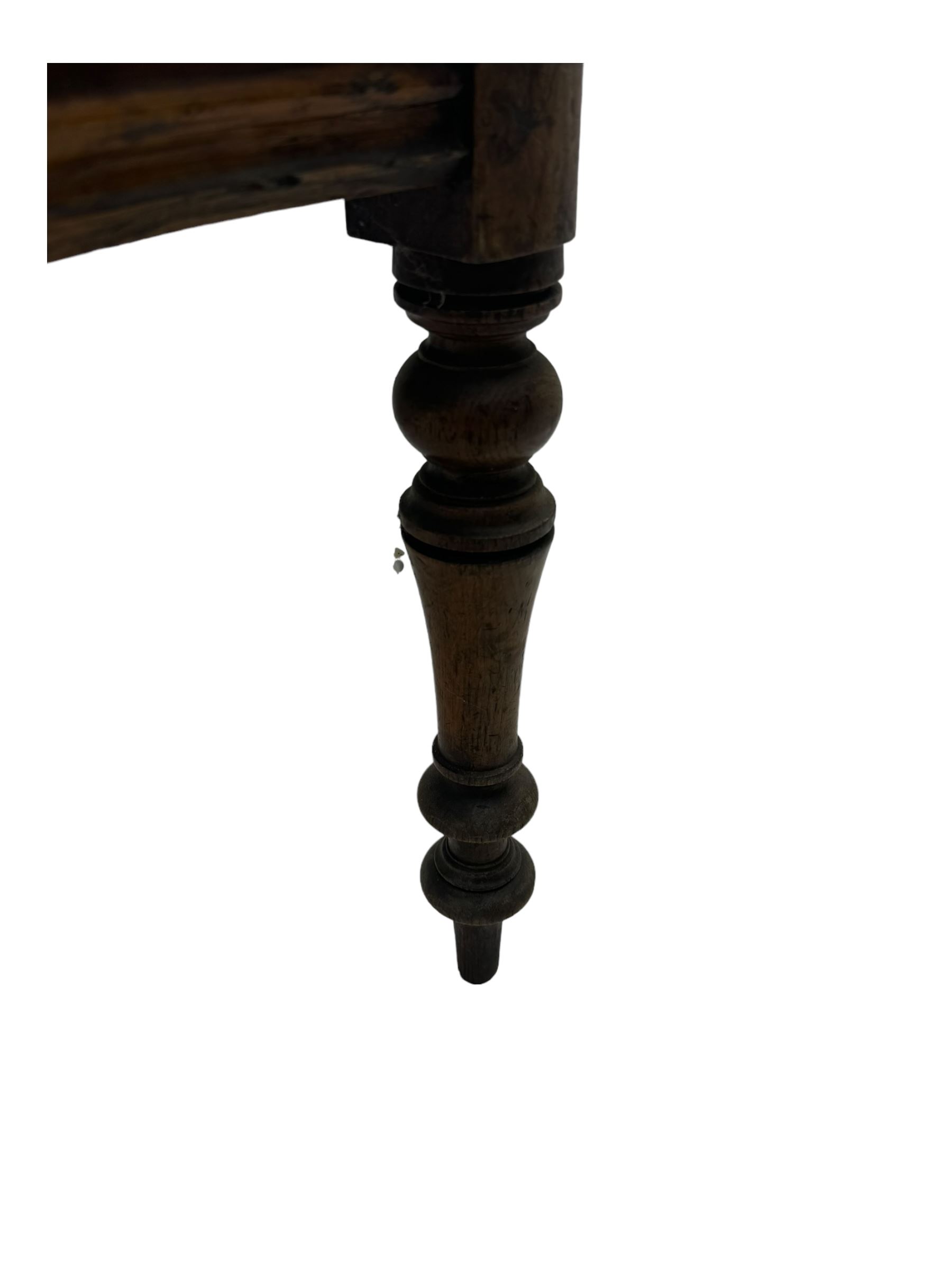 Victorian oak hall chair with scroll carved and pierced back, shaped seat and turned front supports