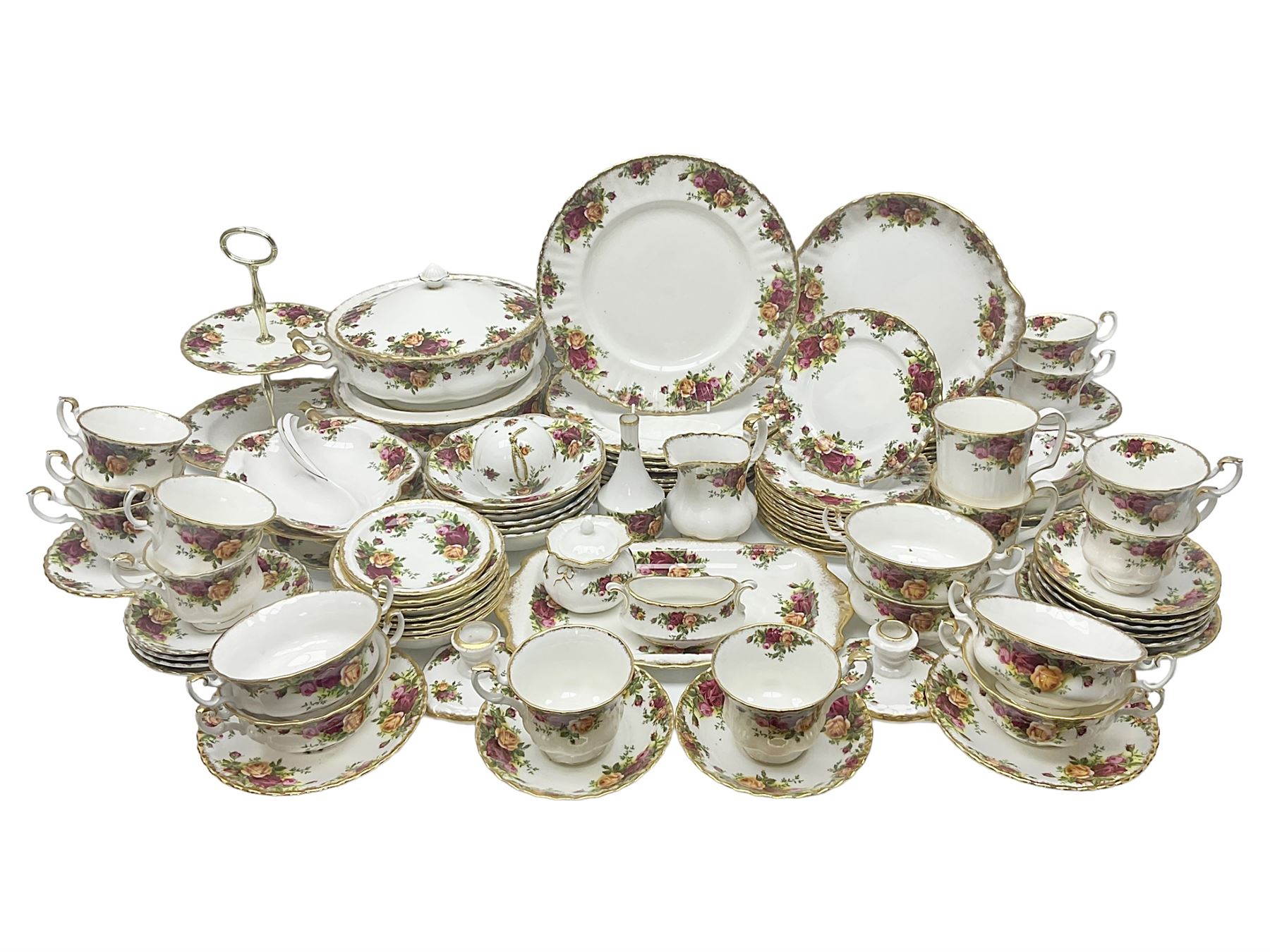 Royal Albert Old Country Roses pattern part tea and dinner service, to include two tureens, eight dinner plates, six side plates, twelve bowls, two mugs, seven teacups and saucers, milk jug,  twelve cake plates, six soup bowls and saucers, candlesticks, etc (95)