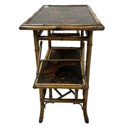 Late 19th century Aesthetic Movement lacquered and painted bamboo occasional table, rectangular top painted with Japanned traditional bird and blossom scenes, over two fold-out side leaves and undertier with pierced gallery apron