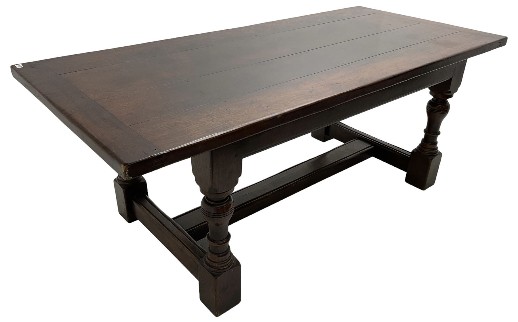 20th century oak refectory dining table, rectangular cleated top on turned supports joined by H-stretcher