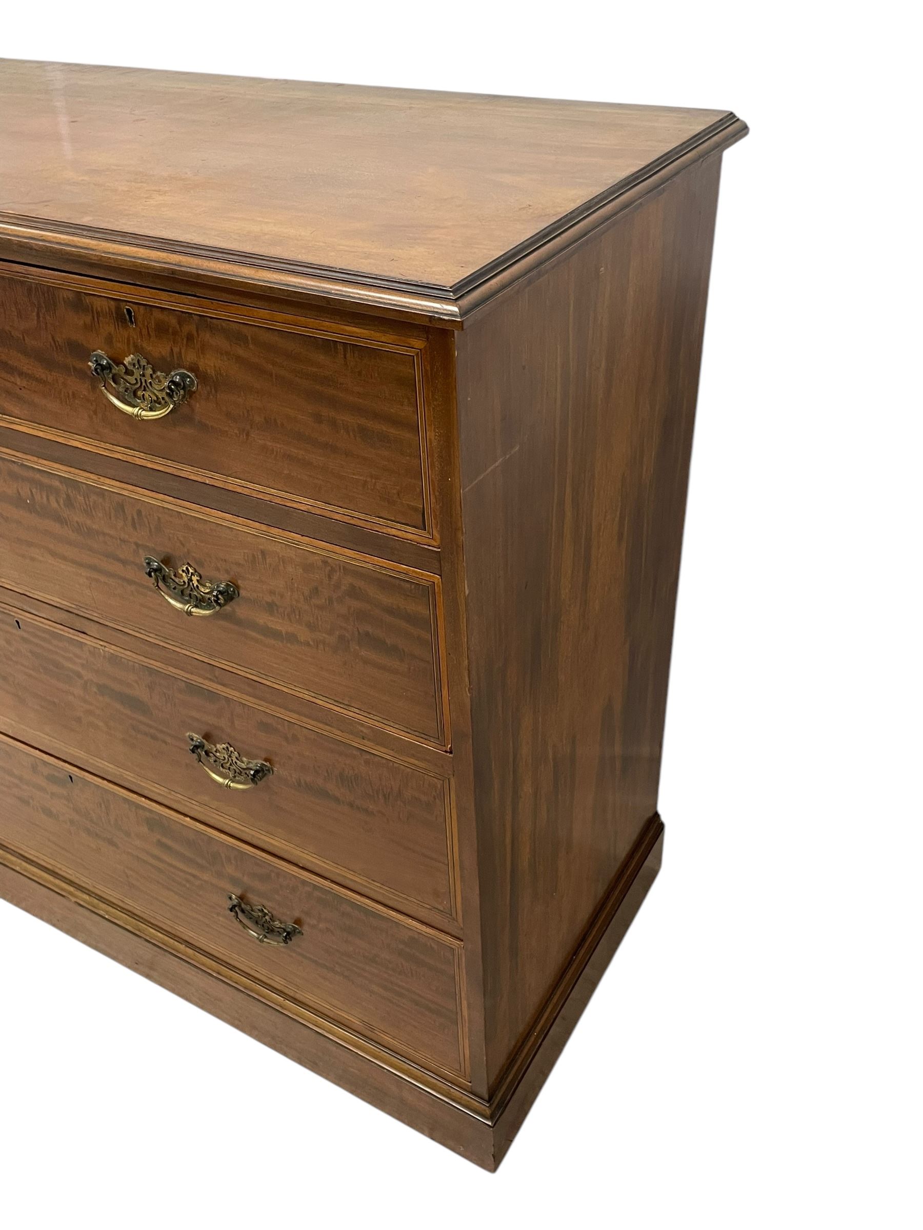 Late Victorian mahogany chest, moulded rectangular top over two short and three long graduating drawers, the drawer fronts inlaid with satinwood bands, boxwood and ebony stringing, on moulded plinth base 