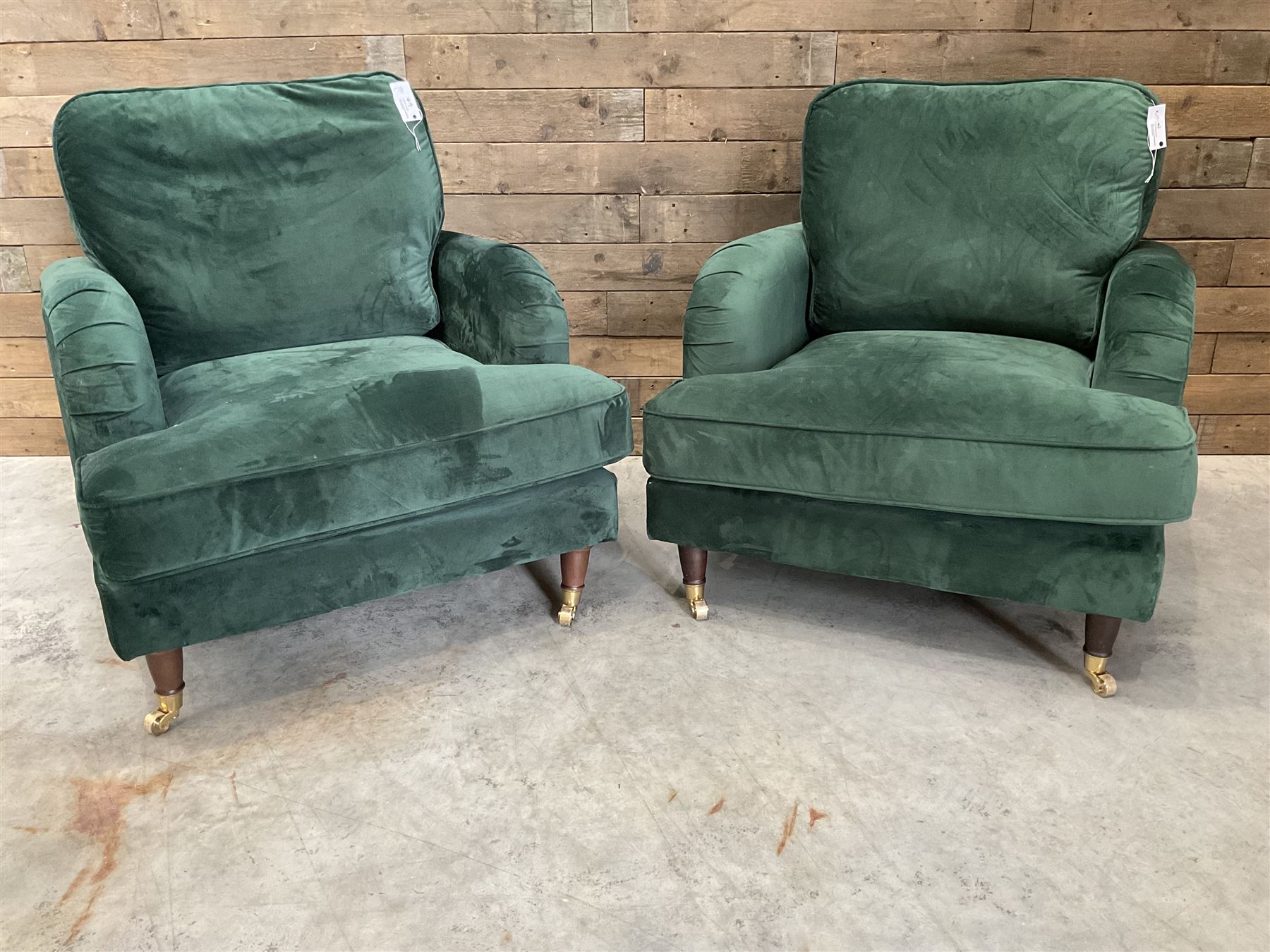 Pair of Howard design armchairs, upholstered in jade green velvet fabric