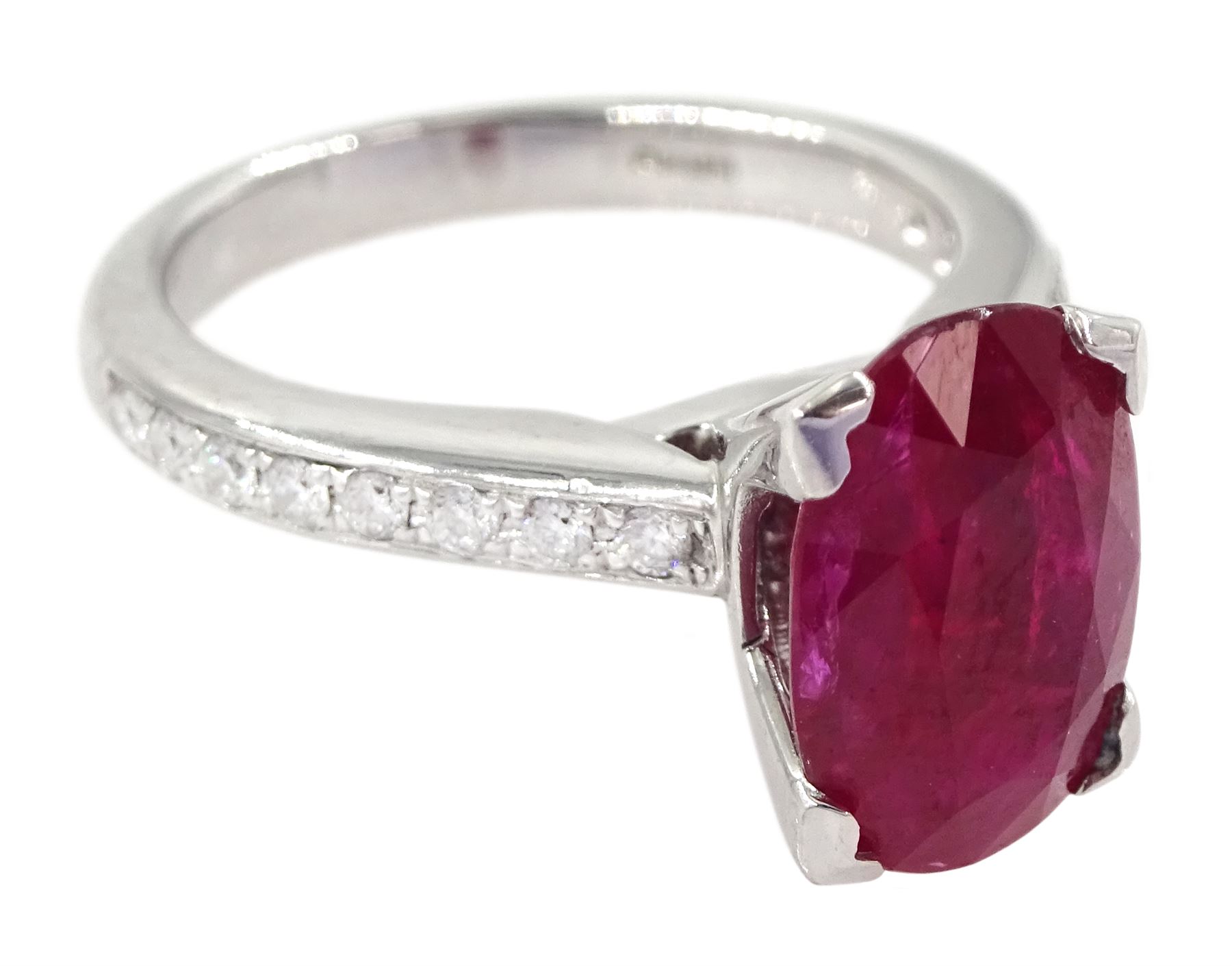 18ct white gold oval cut ruby ring, with channel set diamond shoulders, hallmarked, ruby approx 2.75 carat