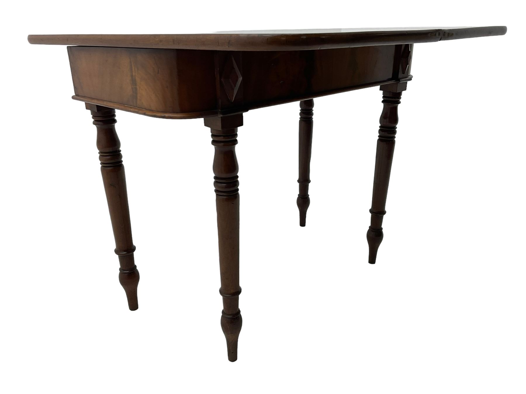 19th century mahogany tea table, fold-over swivel action rectangular top with rounded corners, figured frieze with stepped lozenge mounts, on turned supports