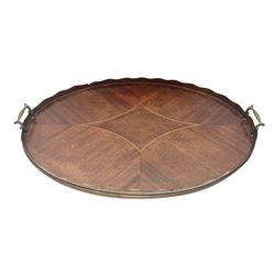 Early 20th century mahogany tray, of oval form with shaped rim and twin brass handles, with inlaid diamond decoration to centre, W67cm