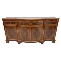 Wade - Georgian design yew wood bow-fronted sideboard, projecting moulded top over four cockbeaded frieze drawers, the central two with pull-out slides, four cupboards below with figured veneers, raised on bracket feet