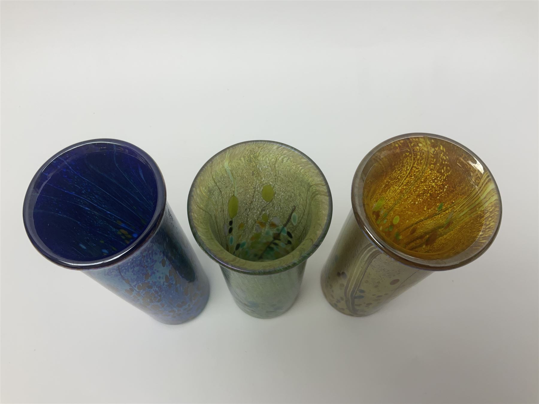 Three Isle of Wight vases of cylindrical form with fluted rim, decorated in Goldberry, Greenberry and Blueberry, each with original box H14cm