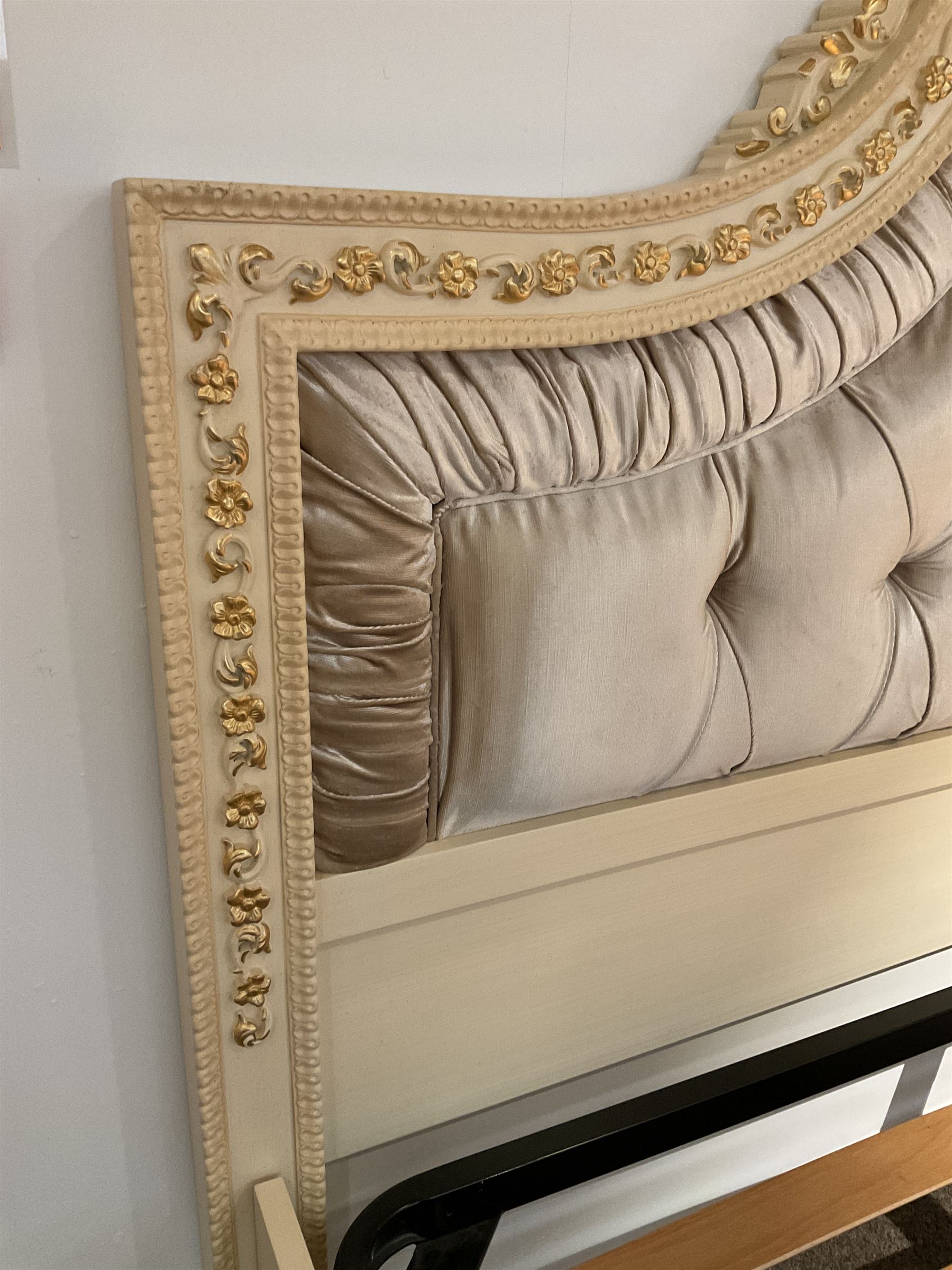 Barnini Oseo - super king 6' 'Reggenza' bedstead, the headboard with a pierced cartouche pediment with extending scrolling foliage, decorated with trailing gilt flower heads, upholstered in buttoned lilac velvet, raised on cabriole feet, in a cream finish