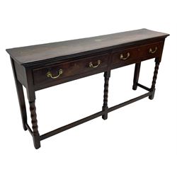 18th century oak dresser base, rectangular top, fitted with two drawers with moulded facia edges and brass swan neck handles, raised on turned front supports united by stretchers