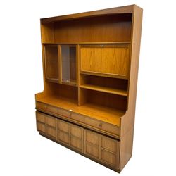 Nathan - teak wall unit, fitted with raised display cabinet and fall front compartment, three drawers and three cupboards below