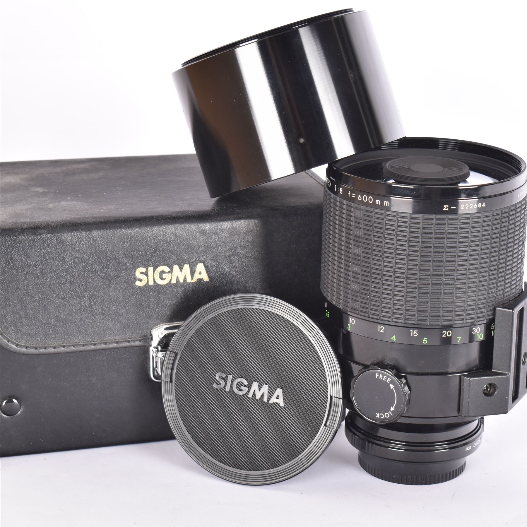 Sigma Mirror-Telephoto Multi-Coated 1:8 f=600mm camera lens, serial no. 222684, with two lens caps, hood, filters, instruction booklet and case