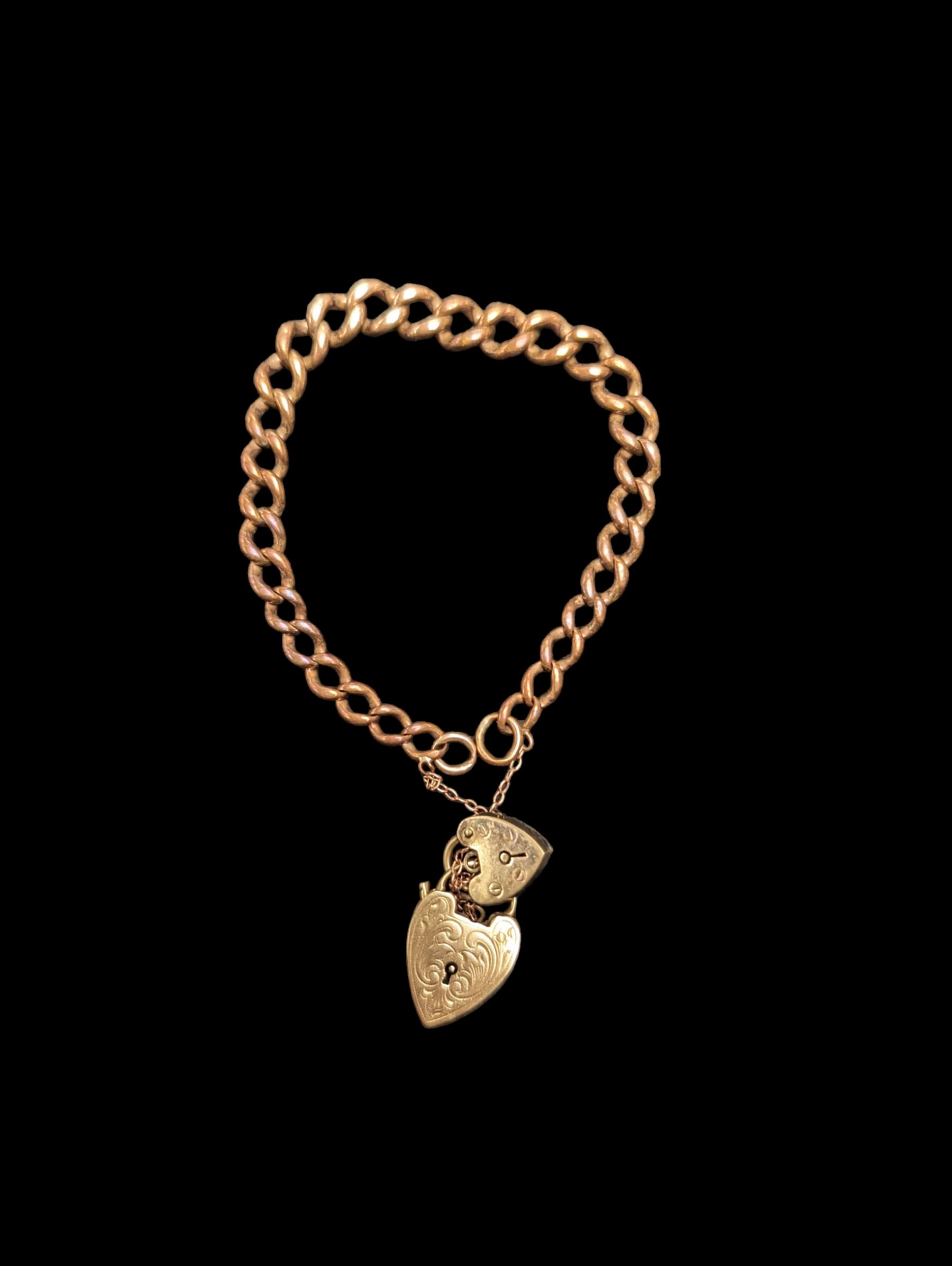 9ct gold curb link bracelet, with a 9ct gold heart padlock clasp