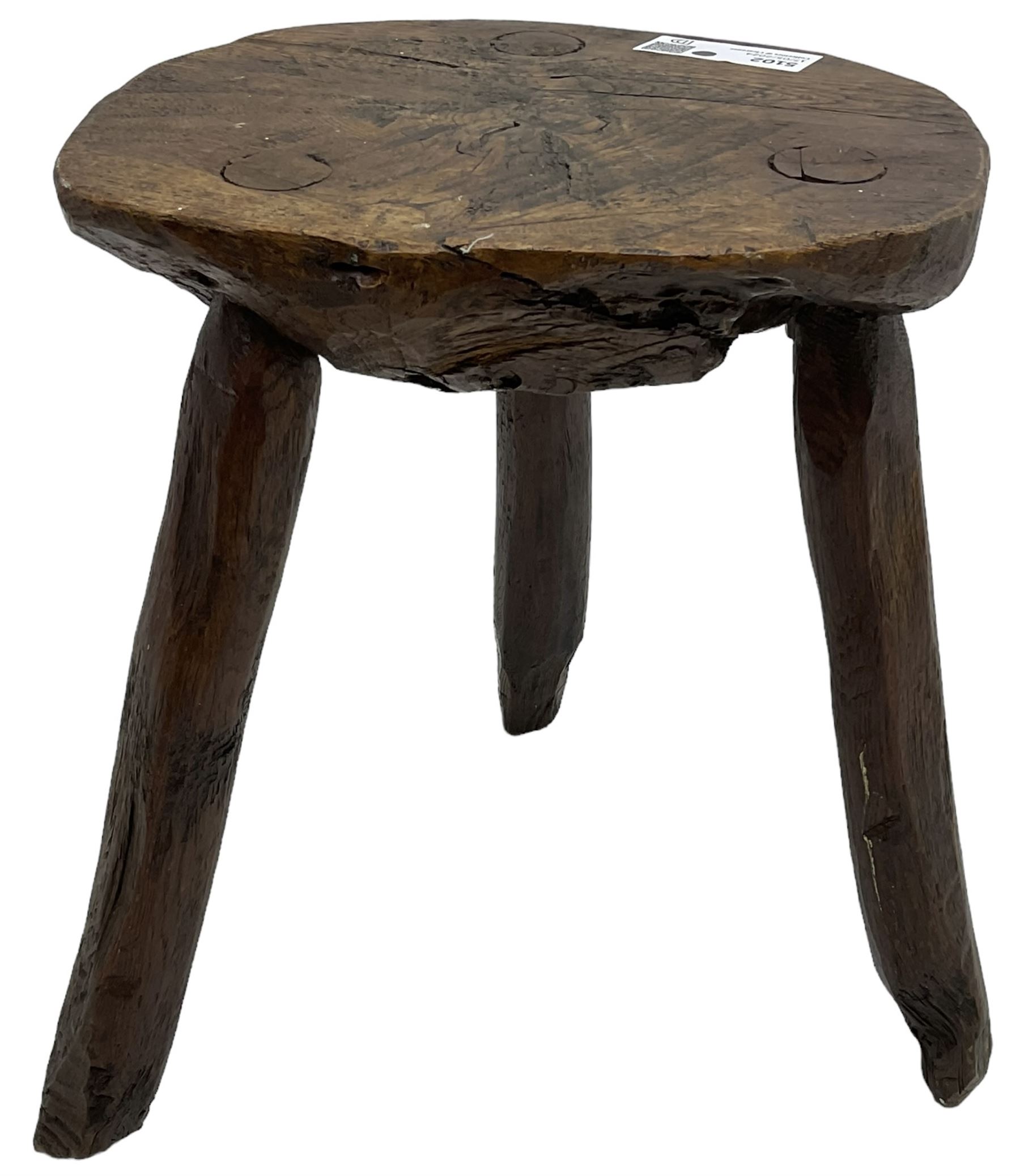 Rustic oak three-legged stool