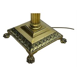 20th century brass standard lamp, Corinthian column stem on moulded square base with paw feet 