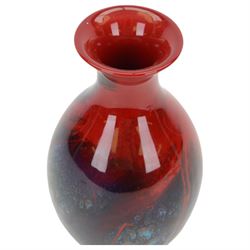 Early 20th century Royal Doulton 'Sung' flambe vase, of baluster form with mottled green/blue decoration upon a red ground, signed FM, Noke and Sung beneath, with Royal Doulton backstamp, H16cm