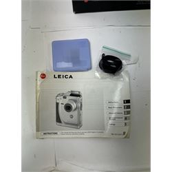 Leica C11 APS film compact camera, in silver and chrome finish, serial no. 2636834, in original clear hard case and box, with instruction booklet, together with a Leica Digilux 4.3, with 1:2.8-4.5/8.3-24.9mm lens, serial no. 2598862, with instruction booklet