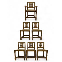 Rabbitman - set of six (5+1) oak dining chairs, pierced and carved lattice back, leather upholstered seat with stud band, on octagonal supports united by stretchers, carved with rabbit signature, by Peter Heap of Wetwang 