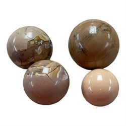 Collection of four stone spheres including Jasper examples 