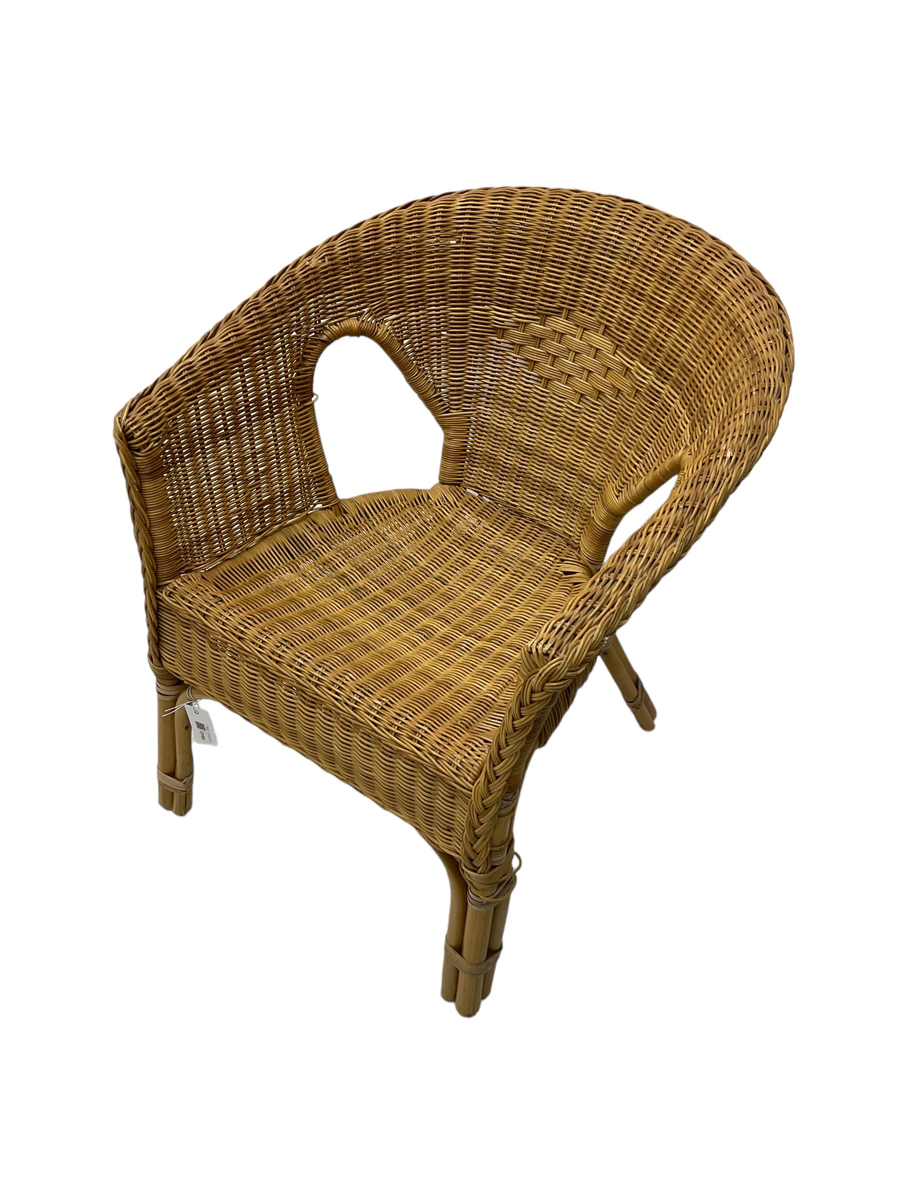 Wicker tub shaped armchair