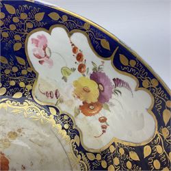 19th century continental bowl, decorated with hand painted floral sprays amongst gilt foliate decoration on a cobalt blue ground, D27.5cm