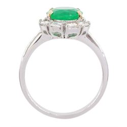 18ct white gold oval cut emerald and baguette cut diamond cluster ring, stamped 750, emerald approx 2.05 carat, total diamond weight approx 0.40 carat