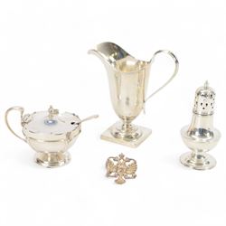 Group of silver, comprising Edwardian helmet shaped jug, upon square base, hallmarked Jame...