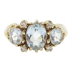 9ct gold three stone oval cut aquamarine and four stone round brilliant cut diamond ring, ...