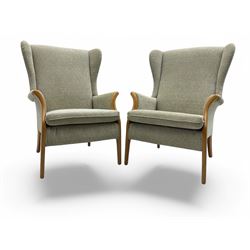 Parker Knoll - pair of beech framed armchairs, upholstered in leaf motif fabric, high back...