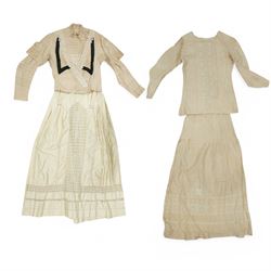 Two Edwardian childrens or ladies bodices and skirts, in cream with panels of contrasting ...