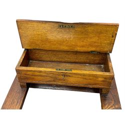 Early 20th century oak vanity stand, with circular adjustable mirror, brass towel rails to the sides, marble inset top and upper compartment, over additional storage compartment with hinged front, on splayed supports with stretchers