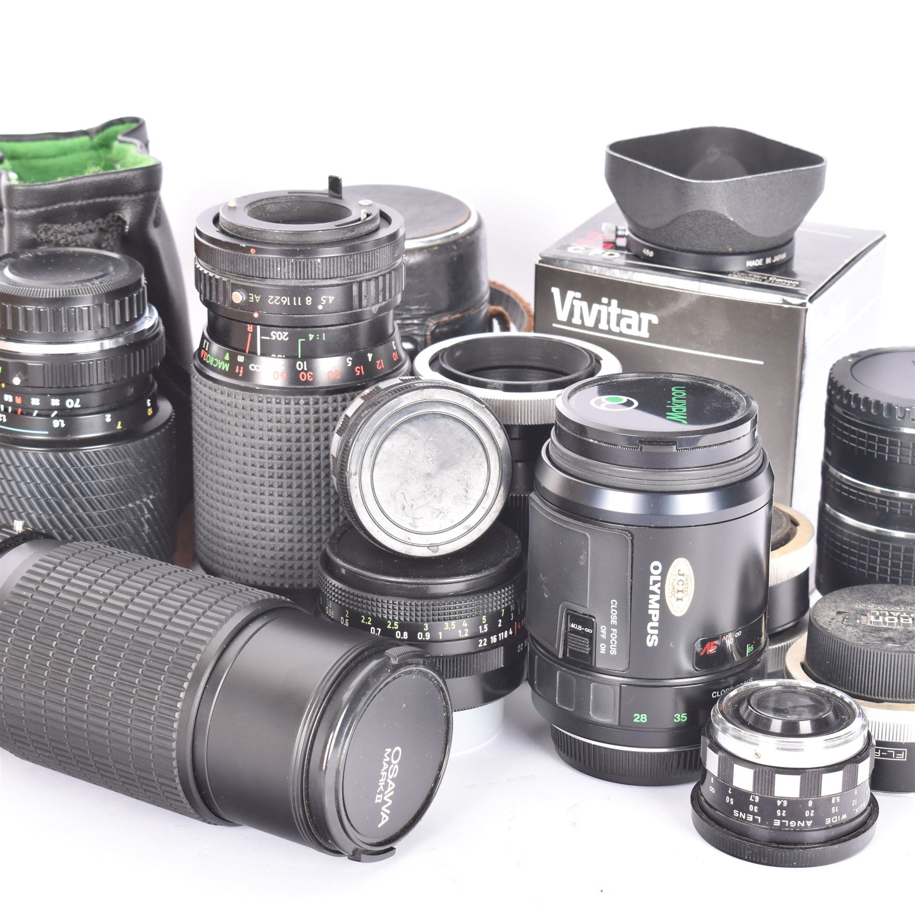 Group of camera lenses by various makers, including Vivitar 19mm 1:3.8 MC wide angle lens serial no. 97040355, boxed, Kestrel MC Auto Zoom 1:4.5 f=80-205mm lens serial no. 710269, Tokina SD 70-210mm 1:4-5.6 lens serial no. 8805753, Osawa MC 1:4.5 80-205mm Macro lens serial no. 5223217, Olympus AF zoom 28-85mm 1:3.5-4.5 lens serial no. 516854, Hanimex Tele-Lens 1:2.8 f=135mm lens serial no. H61532, together with converters and other accessories