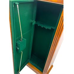 21st century steel lined gun cabinet, modelled as a Wellington chest of yew wood, to hold six long guns, interior lined with green baize, three storage shelves, with keys and bolts 