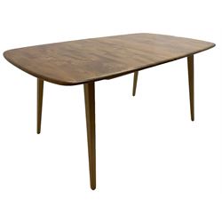 Ercol - light elm and beech 'Slide Leg Expanding Dining Table (444)', rectangular top with rounded corners, raised on tapered splayed supports, with two additional leaves