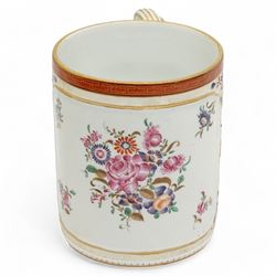 Large porcelain tankard by Samson of Paris, decorated in the Chinese Export famille rose style with panels of flowers, against a low relief ground of butterflies and floral sprigs, with reeded strapwork handle, H15cm