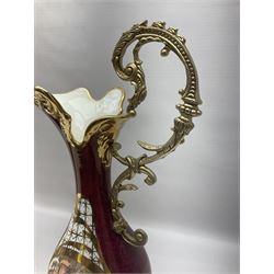 Twin handled vase, the ceramic urn form body decorated with floral sprigs and figural panel, the metal handles designed as vines, together with a similar ewer, vase H75cm 