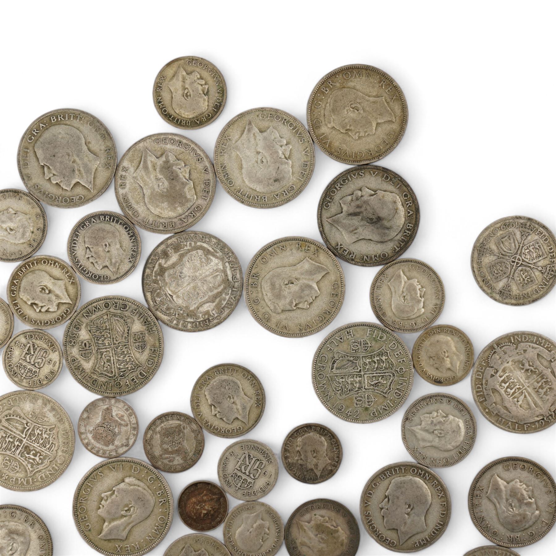 Approximately 610 grams of Great British pre 1947 silver coins, including sixpences, shillings, two shillings, halfcrowns etc