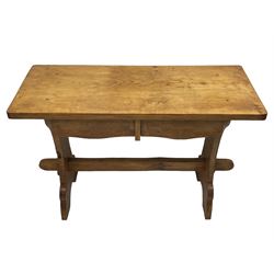 Gnomeman - oak side table, rectangular adzed top over two drawers, on shaped end end supports united by pegged stretcher, carved with gnome signature, by Thomas Whittaker, Littlebeck 