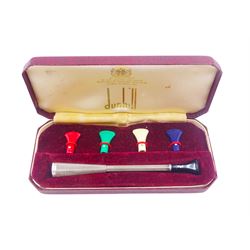 Mid 20th century silver cigarette holder, with engine turned decoration and multicoloured interchangeable mouthpieces, hallmarked Alfred Dunhill & Sons, Birmingham 1965, contained within fitted Dunhill case