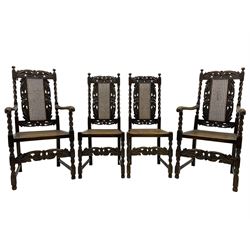 Set of seven (5+2) 19th century Carolean design oak dining chairs, scroll leaf and flower head carved cresting rail over spiral turned uprights and cane work back, the cane work seat on spiral turned supports united by plain stretchers, scrolled leaf carved middle rail 