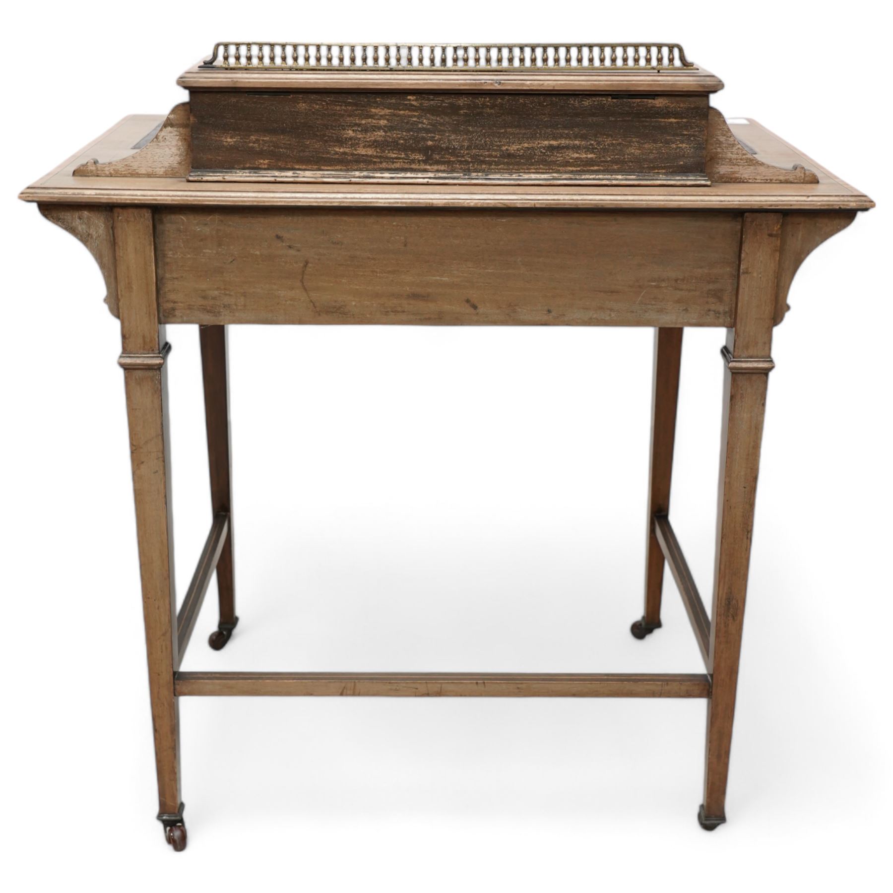 Edwardian inlaid mahogany writing desk, raised correspondence compartment over leather inset top, fitted with single drawer, on square tapering supports with brass and ceramic castors 