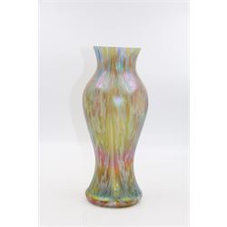 Austrian Art Nouveau iridescent glass vase, in the manner of Loetz, of baluster form with dimpled body, the pale blue glass with colourful iridescence throughout, H28cm