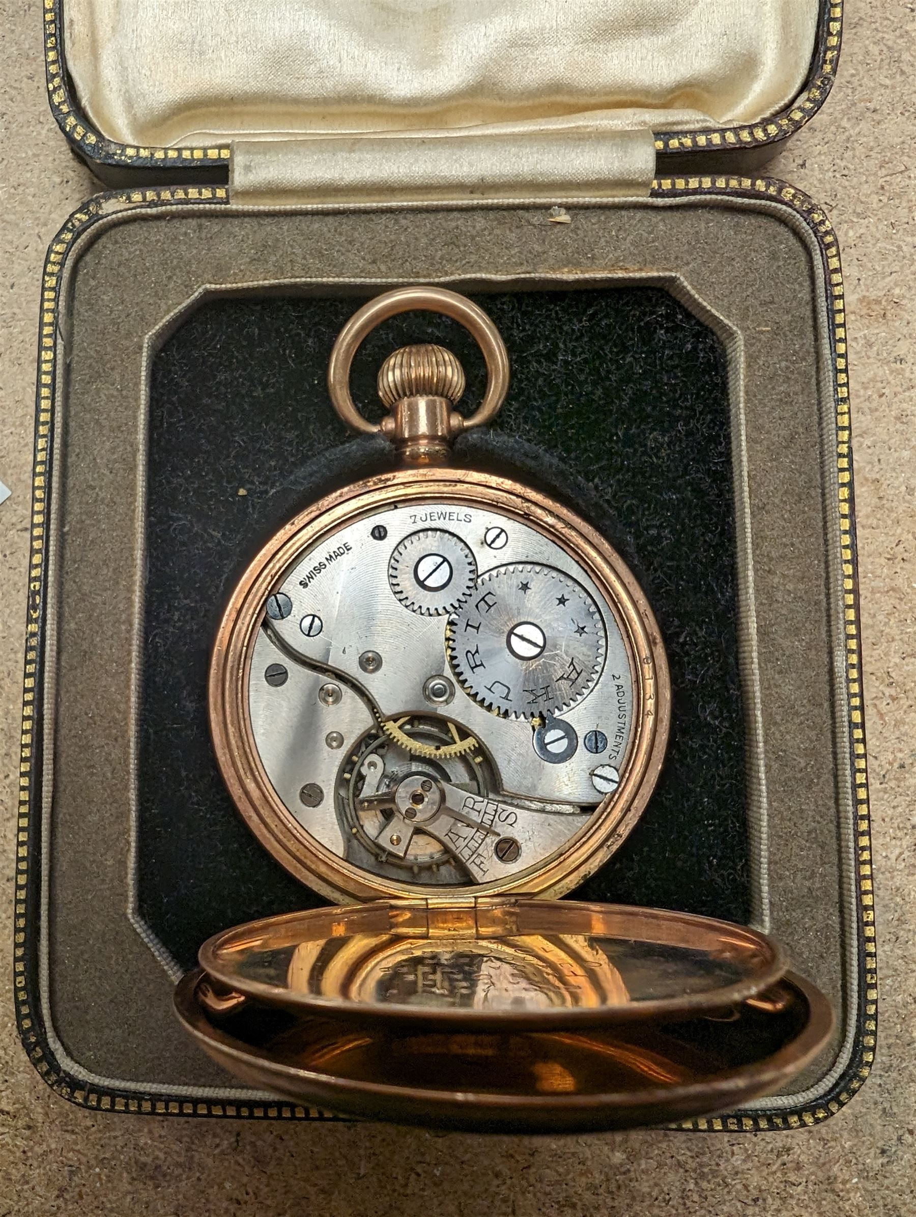 Gold plated half hunter pocket watch, the white enamel dial inscribed The Sheffield Goldsmiths Co. Ltd, with subsidiary seconds dial, the case marked Dennison Watch Case Co Ltd, boxed 