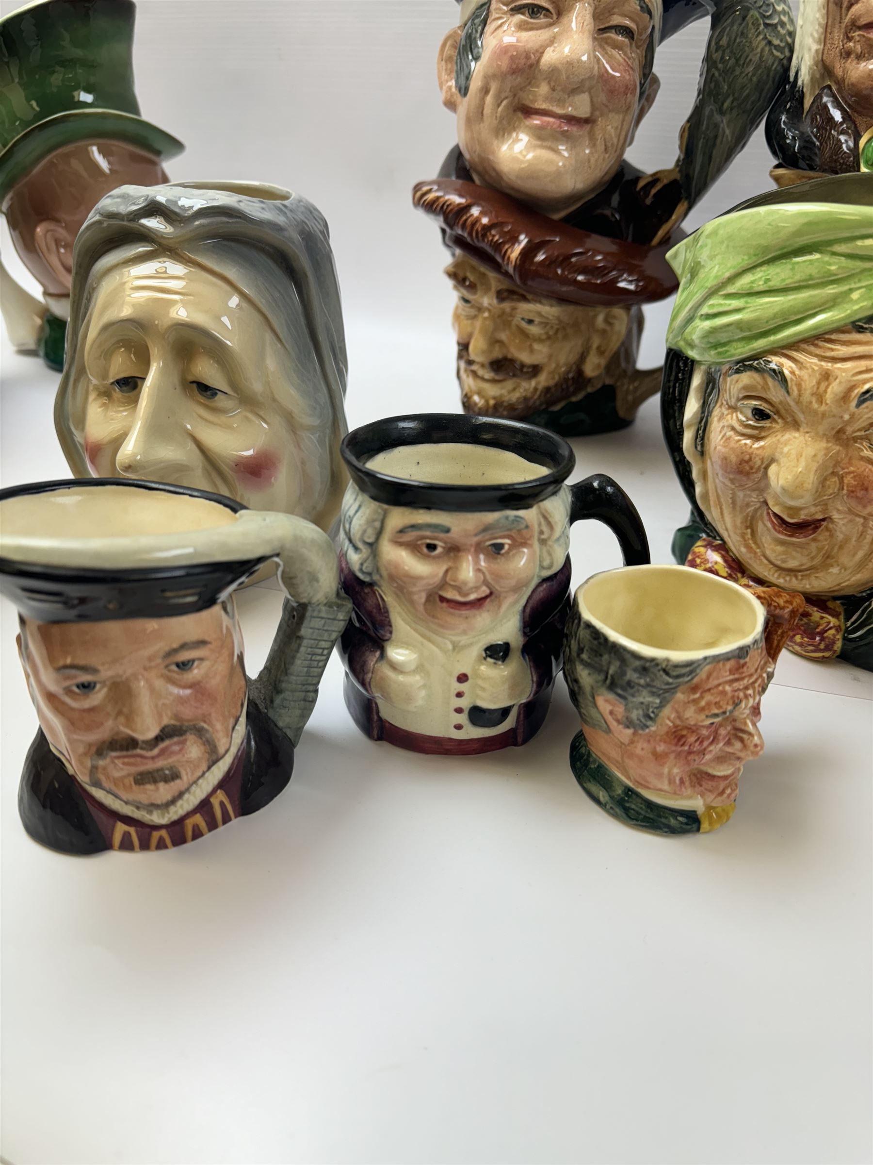 Collection of character jugs, including Royal Doulton Long John Silver, The Falconer, Granny etc