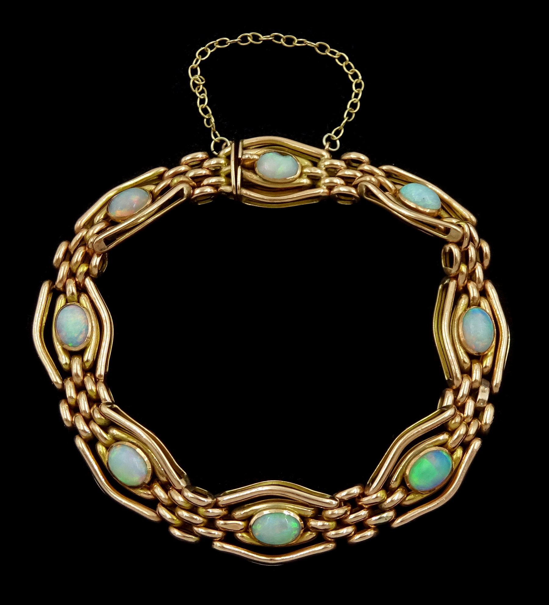 Early 20th century rose gold opal link bracelet, stamped 9ct