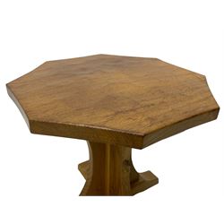 Mouseman - oak occasional table, octagonal adzed top, cruciform pedestal on sledge feet, carved with mouse signature, by the workshop of Robert Thompson, Kilburn 