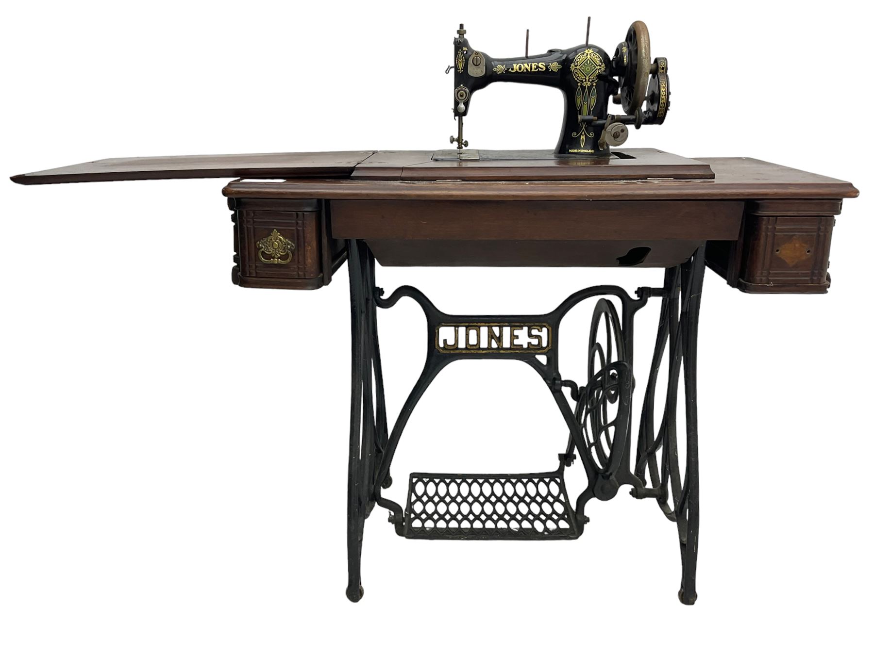 Early 20th century Jones treadle sewing machine table, bevel edged rectangular top with hinged lid enclosing sewing machine no. 480760, supported by cast iron treadle base