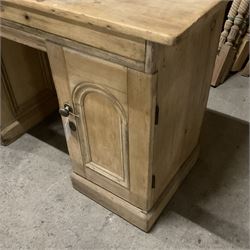 Victorian pine twin pedestal desk, rectangular to over four drawers, central shallow drawer and panelled cupboard, the removable top reveals hidden storage compartments, on skirted base - THIS LOT IS TO BE COLLECTED BY APPOINTMENT FROM THE OLD BUFFER DEPOT, MELBOURNE PLACE, SOWERBY, THIRSK, YO7 1QY